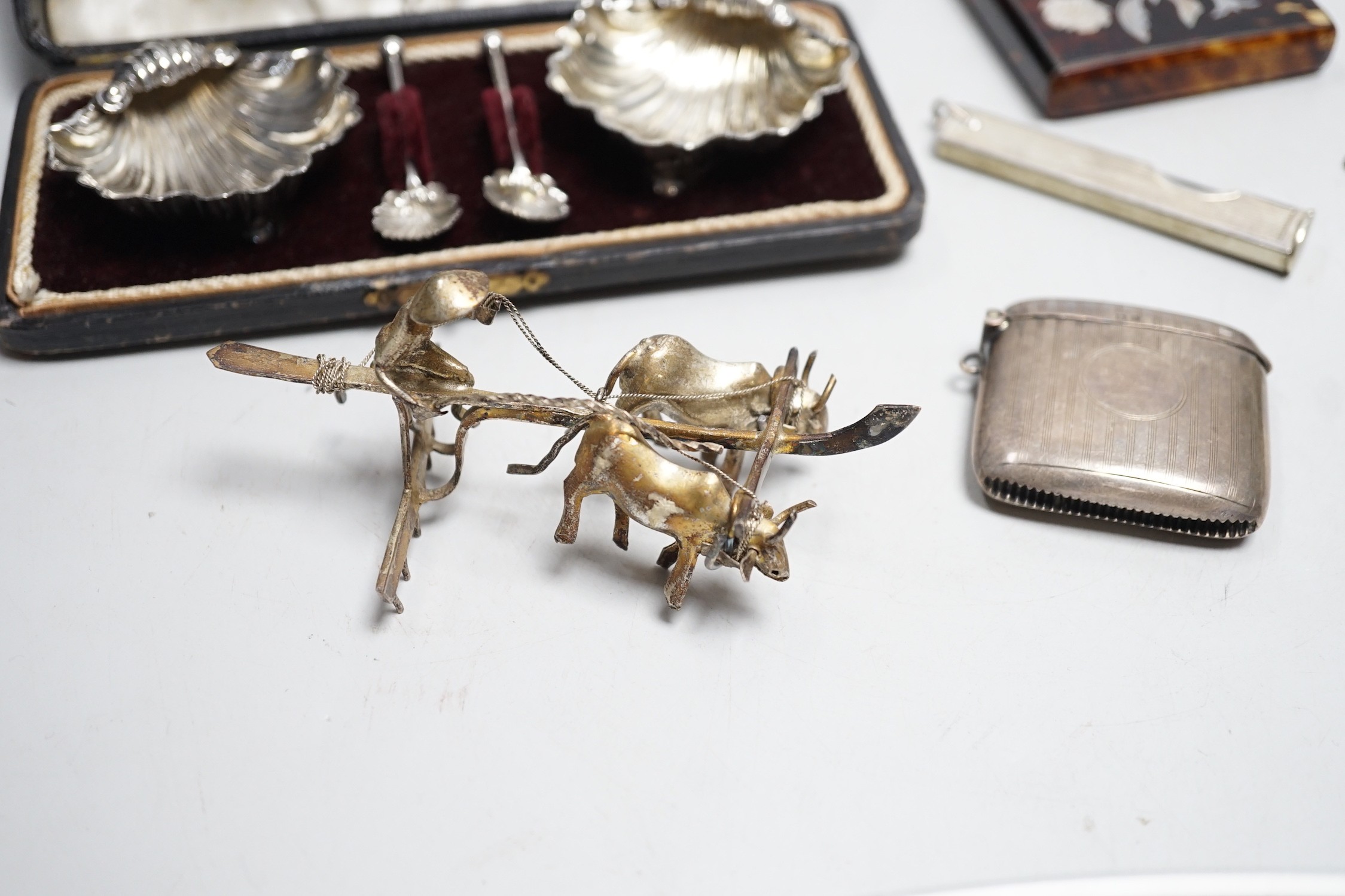 A cased pair of Edwardian silver shell salts, with spoons, and other items including Edwardian silver mounted bird pin cushion, by Sampson Mordan & Co, vesta cases, inlaid tortoiseshell card case etc.